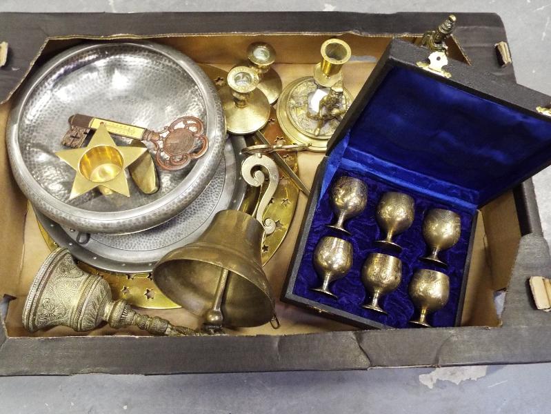 A box of brassware including two brass b