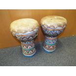 Two ceramic bongo's animal skin drum