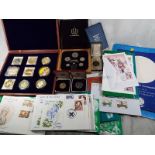 A boxed set of UK commemorative plated m