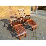 Two hard wood steamer chairs from the Ke