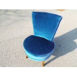 A blue tub chair