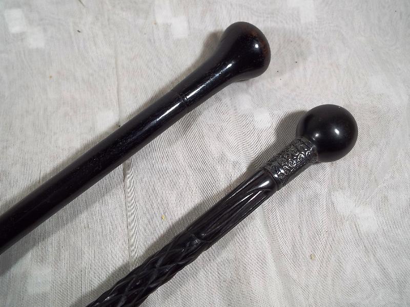 Two gentleman's ebony walking canes of w - Image 2 of 2