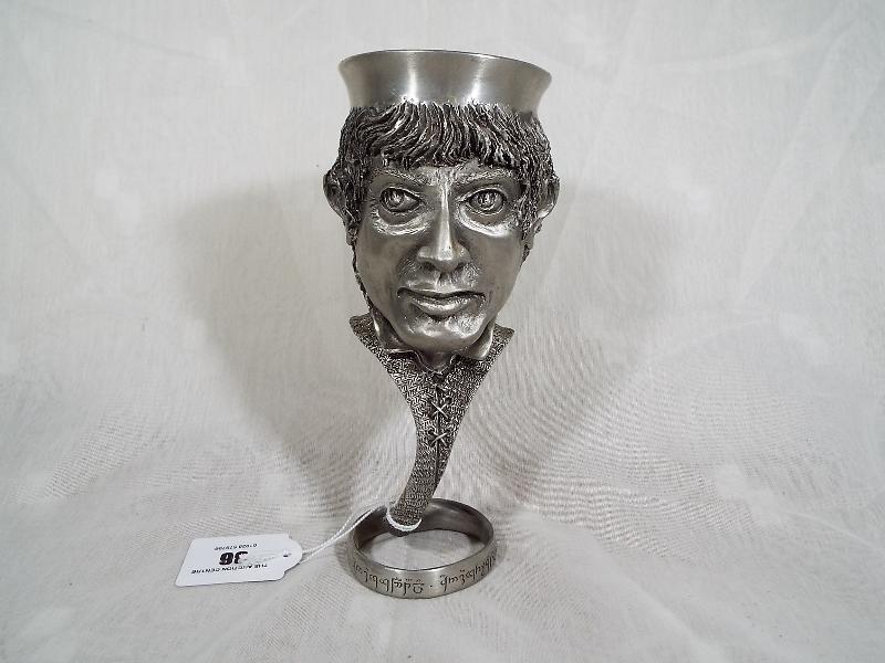 A Royal Selangor Lord of The Rings pewter goblet entitled Frodo Baggins, 18.5cm (h), signed to the