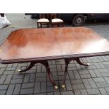 A mahogany extendable table with 6 chairs t 77 cm (h) x 166 cm (l) x  106 cm (d)