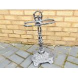 A wrought iron stick stand 59 cm (h)