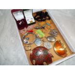 A good mixed lot of costume jewellery to include a large heavy enameled belt buckle in the form of