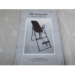 A Pro Inversion exercise machine needs assembling with instructions.