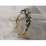 A lady's gold ring stamped 18 ct (18 carat) set with three stones FDTF approximate weight 1.62