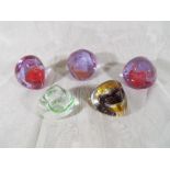 Five Caithness (Scotland) art glass pebble paperweights (5)