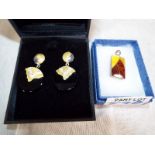 A lady's pair of Paula Bolton silver earrings with an amber pendant - Est £20 - £40