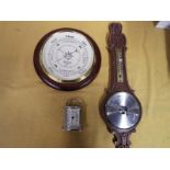 Two wall mounted aneroid barometers and a quartz carriage clock (3) Est £10 - £20