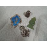 A Eastern style enameled silver brooch, a hard stone pendant, an hallmarked silver brooch in the
