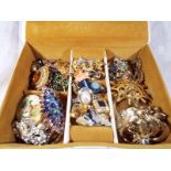 A jewellery box containing a quantity of good quality costume jewellery, predominantly brooches