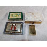 A vintage BSB musical powder compact with original box, a Dandy-Mate Sylvia musical compact, a