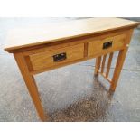 A good quality, contemporary, light wood hall table with twin drawers, 80 cm x 101 cm x 42 cm