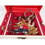 A jewellery box containing a quantity of good costume jewellery to include some silver
