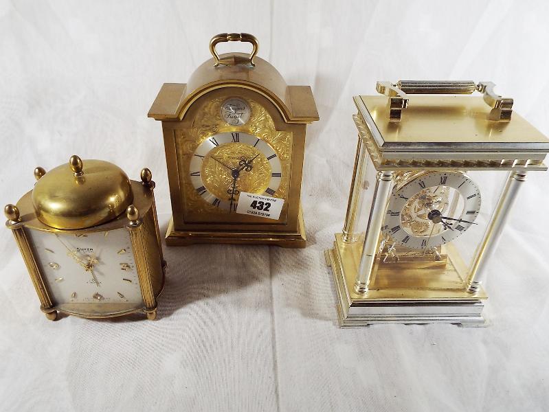 Two Swiza alarm clocks and a battery carriage clock (3) - £30 - £40