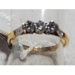 A lady's 14 carat gold ring set with three diamonds, approximate weight 2.12 gm (all in) Est £80 -