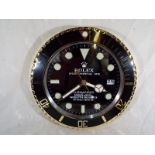 A promotional wall clock, with dial marked Rolex Oyster Perpetual Date, 33.5cm (diam)
