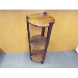 An oak plant stand 92cm (h) x 31cm (dia)