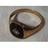 A hallmarked 9 carat gold stone set signet ring, approximate weight 3.6 grams