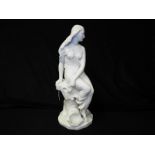 A Copeland Parian Ware figurine depicting a female seated on a pedestal, impressed factory marks to