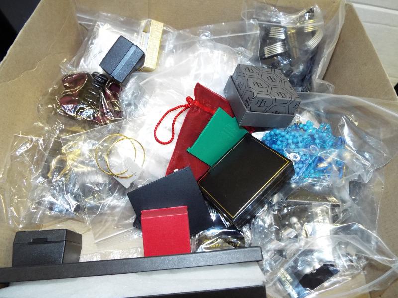 A quantity of unused costume jewellery