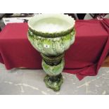 A large ceramic jardiniere and stand, 102cm (h)