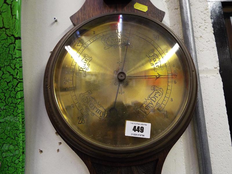 A wall mounted Arts and Craft style aneroid barometer, engraved brass dial and thermometer scale - Image 2 of 2