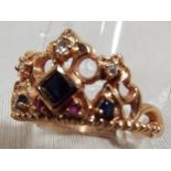 A lady's rose gold sapphire, ruby and diamond dress ring, stamped 585 14 ct, Est £75 - £125