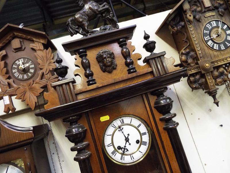 An early 20th century Vienna style wall clock, the mahogany case with turned decoration surmounted - Image 2 of 2