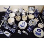 A good mixed lot of Delfts Blauw to include bowls, plates, musical windmills and other (qty) Est