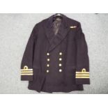 A Royal Navy Commanders jacket - Est £50 - £80