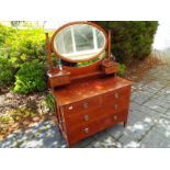 An Edwardian chest of two over two drawers with ring handles and oval swing mirror above, 155cm (h)