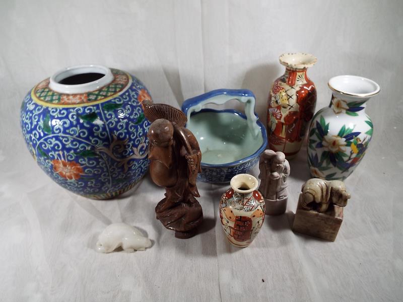 A good mixed lot of Oriental ware to include three hard stone carved figures, a wooden carved - Image 2 of 2