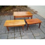 A mahogany coffee table and two further occasional tables (3)