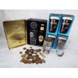 A collection of Guinness memorabilia to include four pint glasses with original boxes, a limited