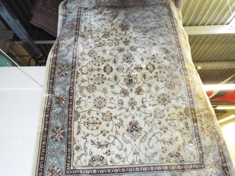 A Beluchi silk rug, 160cm x 230cm