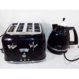 Ex-Display - a Delonghi four slice toaster with matching kettle, in diamond gloss black finish