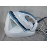 Ex-Display - a Tefal Easy Press steam station in aqua and white Est £50 - £80