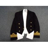 A Royal Navy Commanders part dress uniform