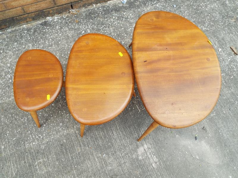 An Ercol nest of three tables in elm and beech designed by Lucian R Erolani - Est £80 - £120 - Image 2 of 2