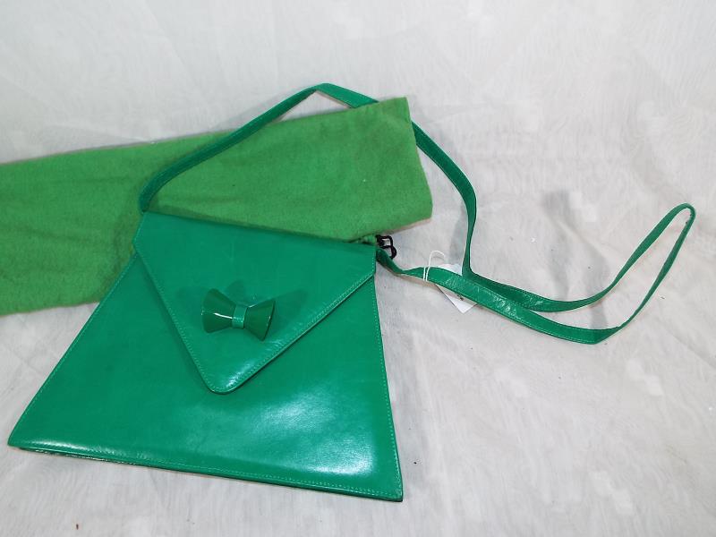 A lady's genuine Charles Jordan bright green envelope handbag with strap displaying logo's and zip - Image 2 of 3