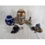 A good mixed lot of Asian ceramics to include three Japanese figurines, a lidded ginger jar