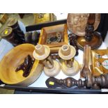 A good mixed lot of treen to include candlesticks, carved animals, massager and other