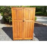 A pine wardrobe 163cm (h) x 100cm (w) x 42cm (d)