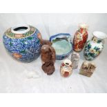 A good mixed lot of Oriental ware to include three hard stone carved figures, a wooden carved