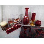 A good mixed lot to include a Murano style glass vase, a basket vase, a collection of candles and