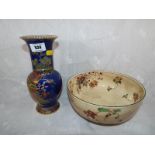 A Royal Doulton bowl with floral decoration, Rd No. 116918 717062, 21cm (diam) and a Carlton Ware