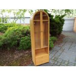 A good quality arch top pine display cabinet, 194cm (h) x 60cm (w) x 38cm (d) - (see also lot 55)